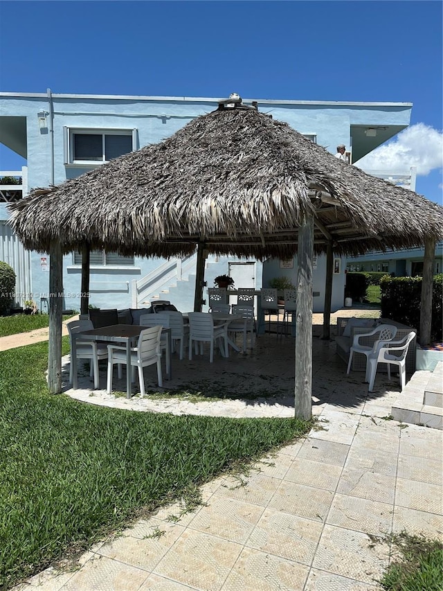 2700 NE 135th St Unit 56, North Miami, FL 33181 - view of patio / terrace featuring outdoor dining space