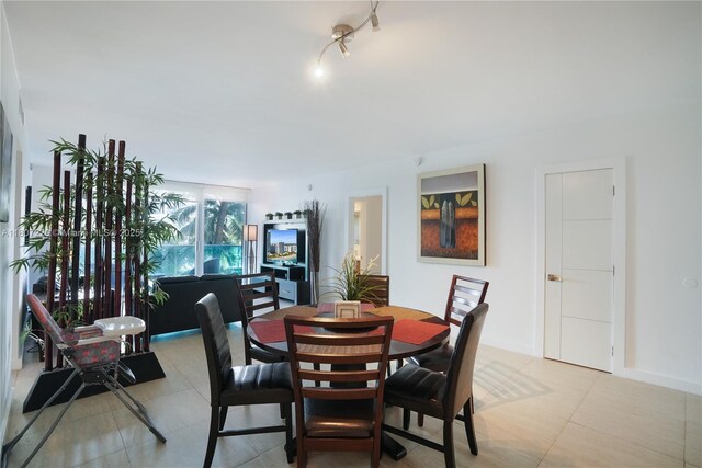 4001 S Ocean Dr Unit 3P, Hollywood, FL 33019 - dining area featuring baseboards
