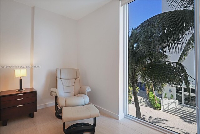 4001 S Ocean Dr Unit 3P, Hollywood, FL 33019 - sitting room featuring baseboards