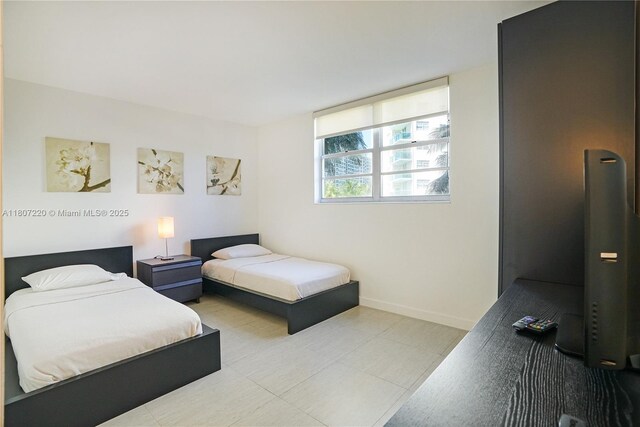 4001 S Ocean Dr Unit 3P, Hollywood, FL 33019 - bedroom featuring baseboards