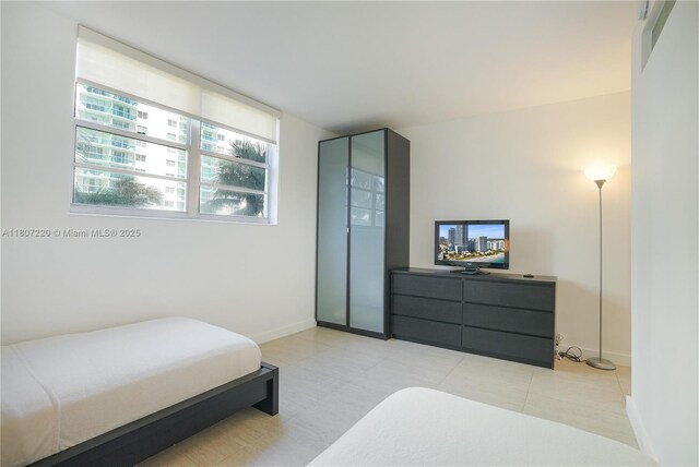 4001 S Ocean Dr Unit 3P, Hollywood, FL 33019 - bedroom with baseboards