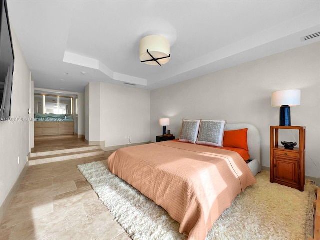 5600 Collins Ave Ph C, Ph C, Miami Beach, FL 33140 - bedroom featuring a raised ceiling, baseboards, and stone finish flooring