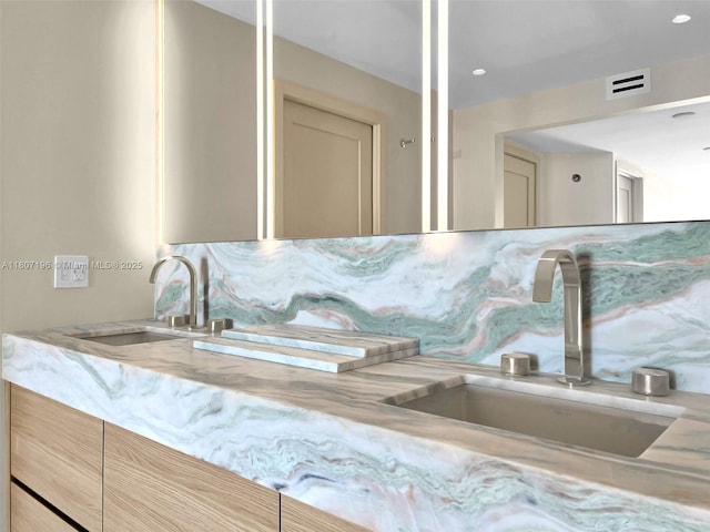 5600 Collins Ave Ph C, Ph C, Miami Beach, FL 33140 - detailed view of a sink, decorative backsplash, and recessed lighting