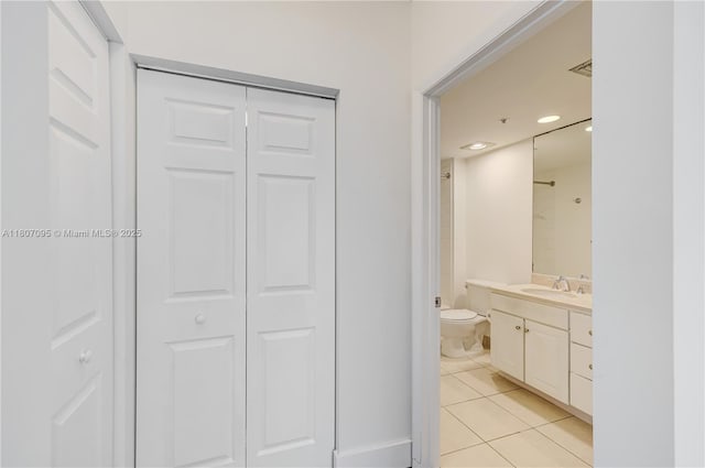 2000 N Bayshore Dr Unit 228, Miami, FL 33137 - bathroom with a closet, tile patterned flooring, vanity, and toilet