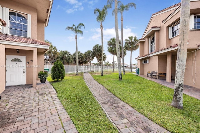 8252 NW 191st Ln Unit 15R, Hialeah, FL 33015 - view of yard with a patio