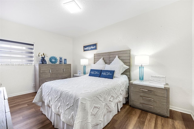 8252 NW 191st Ln Unit 15R, Hialeah, FL 33015 - bedroom with baseboards and wood finished floors