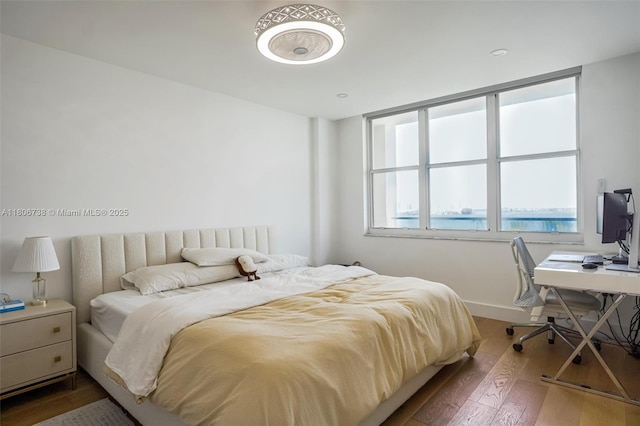 800 Claughton Island Dr Unit 1504, Miami, FL 33131 - bedroom with hardwood / wood-style floors, baseboards, and an office area