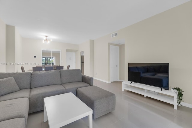 4400 Hillcrest Dr Unit 107A, Hollywood, FL 33021 - living room with baseboards, a chandelier, and tile patterned flooring