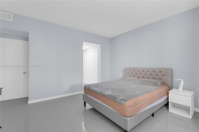 4400 Hillcrest Dr Unit 107A, Hollywood, FL 33021 - bedroom featuring baseboards and tile patterned flooring