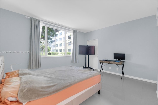 4400 Hillcrest Dr Unit 107A, Hollywood, FL 33021 - tiled bedroom with baseboards