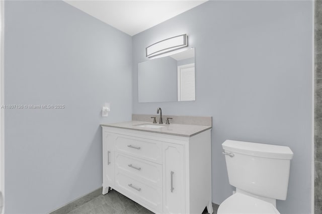4400 Hillcrest Dr Unit 107A, Hollywood, FL 33021 - bathroom featuring toilet, vanity, and baseboards