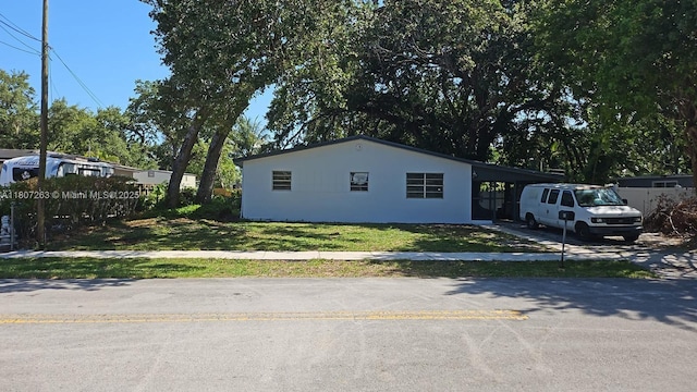 4110 SW 32nd Ct, West Park, FL 33023 - view of front facade featuring a front yard, stucco siding, and driveway