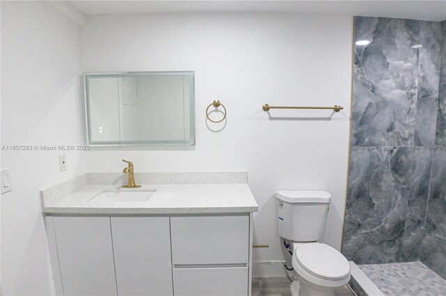 4110 SW 32nd Ct, West Park, FL 33023 - bathroom featuring vanity, a shower, and wood finished floors