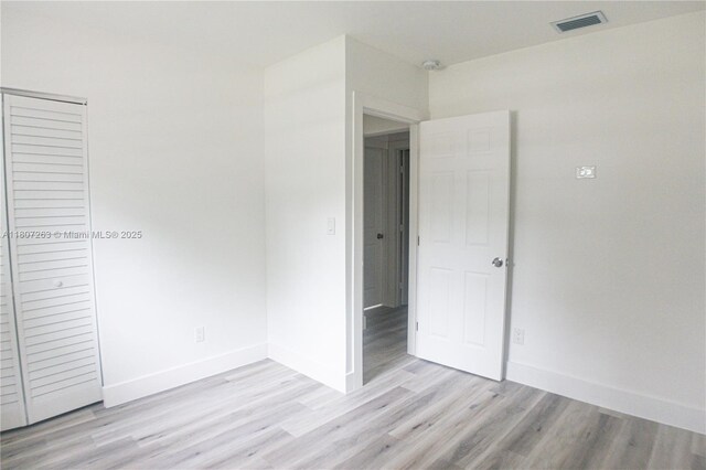 4110 SW 32nd Ct, West Park, FL 33023 - unfurnished bedroom featuring light wood finished floors and a closet
