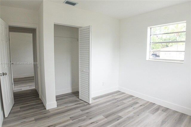 4110 SW 32nd Ct, West Park, FL 33023 - unfurnished bedroom featuring light wood-style floors and a closet