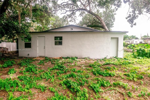 4110 SW 32nd Ct, West Park, FL 33023 - view of side of home with stucco siding