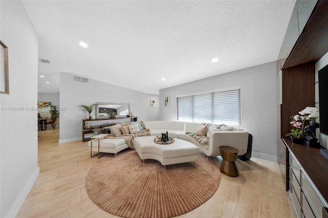 6847 NW 24th Way, Fort Lauderdale, FL 33309 - living room with lofted ceiling, light wood-type flooring, and recessed lighting