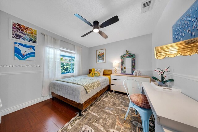 6847 NW 24th Way, Fort Lauderdale, FL 33309 - bedroom featuring wood finished floors, a textured ceiling, and ceiling fan
