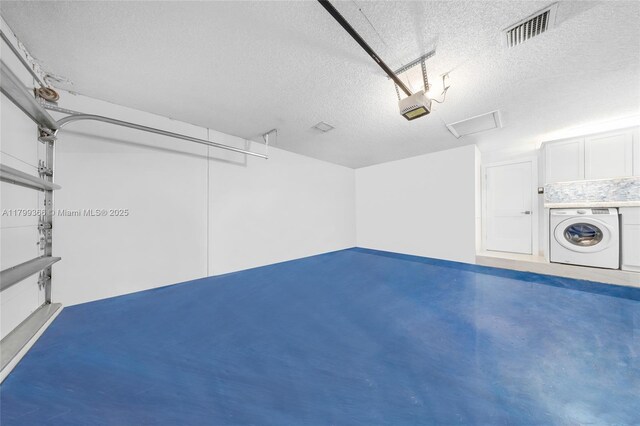 6847 NW 24th Way, Fort Lauderdale, FL 33309 - garage with washer / clothes dryer and a garage door opener