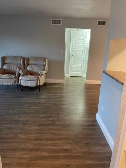 927 Riverside Dr Unit 326, Coral Springs, FL 33071 - living room featuring wood finished floors and baseboards