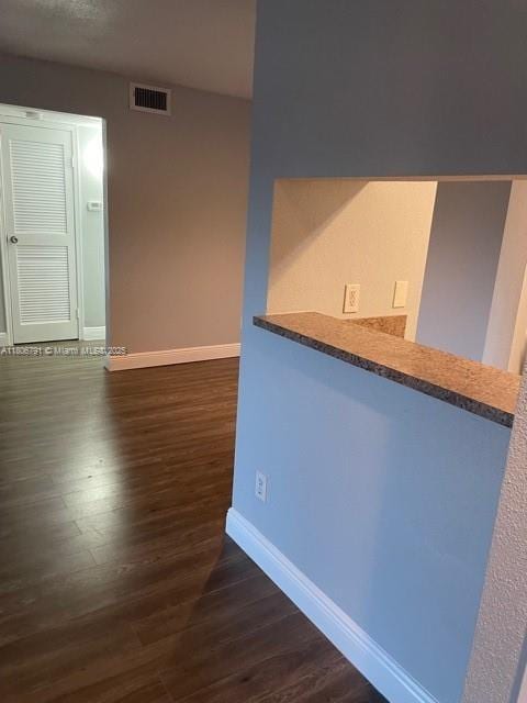 927 Riverside Dr Unit 326, Coral Springs, FL 33071 - unfurnished room featuring baseboards and wood finished floors