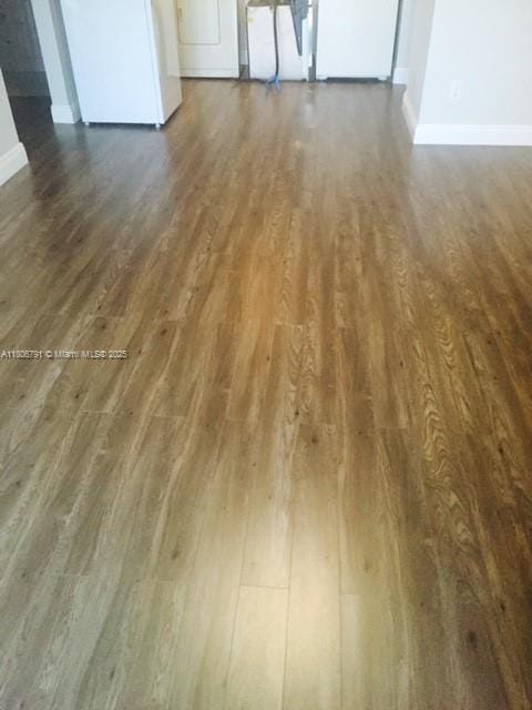 927 Riverside Dr Unit 326, Coral Springs, FL 33071 - detailed view of wood finished floors and baseboards
