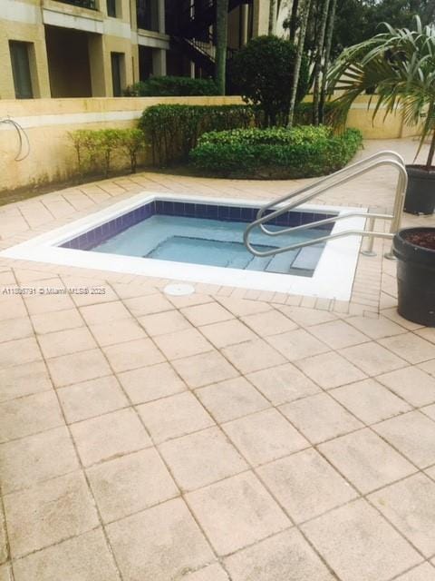 927 Riverside Dr Unit 326, Coral Springs, FL 33071 - view of pool with a patio area