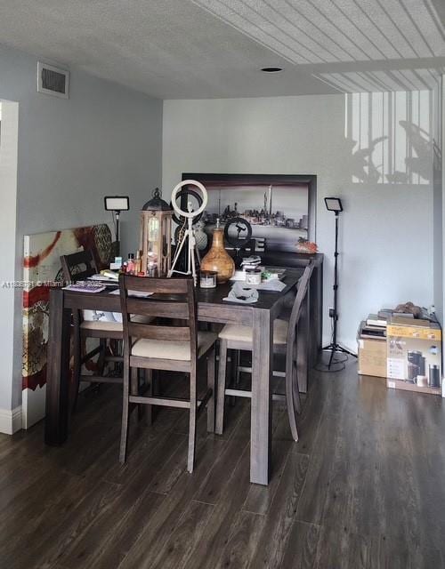 927 Riverside Dr Unit 326, Coral Springs, FL 33071 - dining room with wood finished floors and a textured ceiling