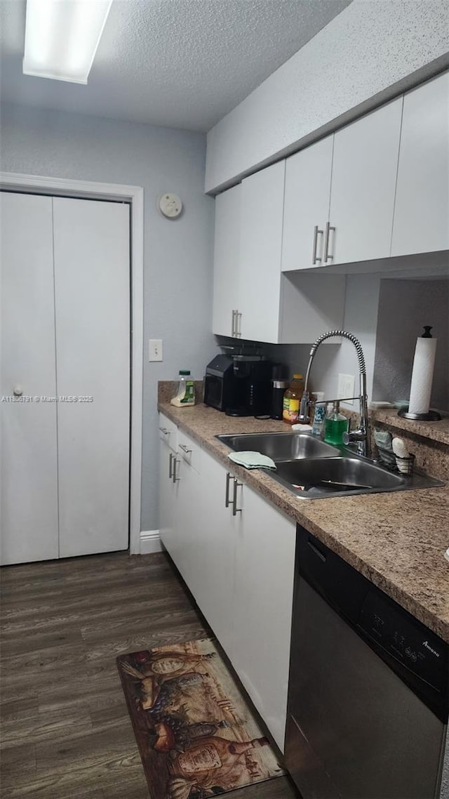 927 Riverside Dr Unit 326, Coral Springs, FL 33071 - kitchen featuring dishwasher, a sink, white cabinets, dark wood finished floors, and a textured ceiling
