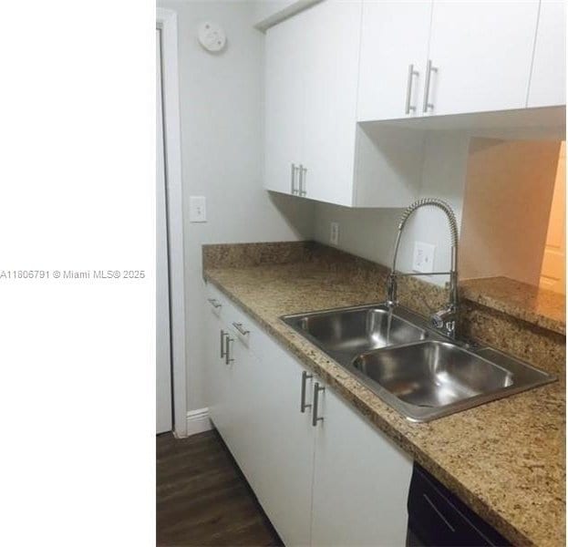 927 Riverside Dr Unit 326, Coral Springs, FL 33071 - kitchen with a sink, white cabinets, dark wood finished floors, and dishwashing machine