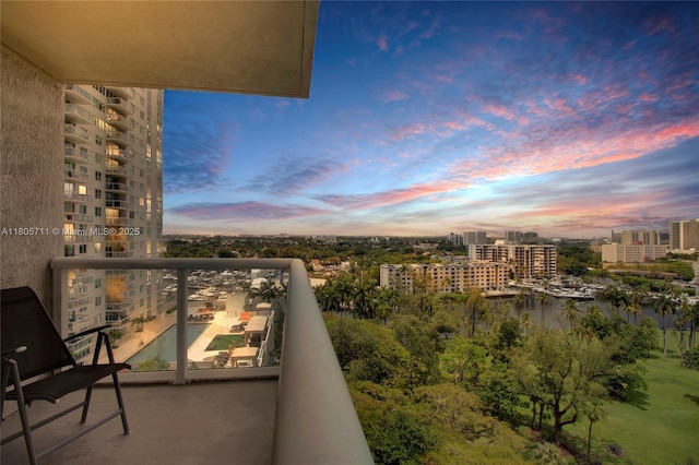 1871 NW S River Dr Unit 1407, Miami, FL 33125 - balcony at dusk featuring a view of city