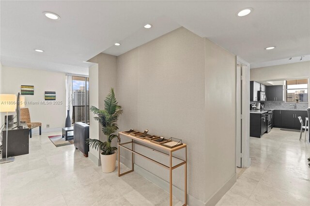 18181 NE 31st Ct Unit Ph07, Aventura, FL 33160 - hall with recessed lighting and a sink
