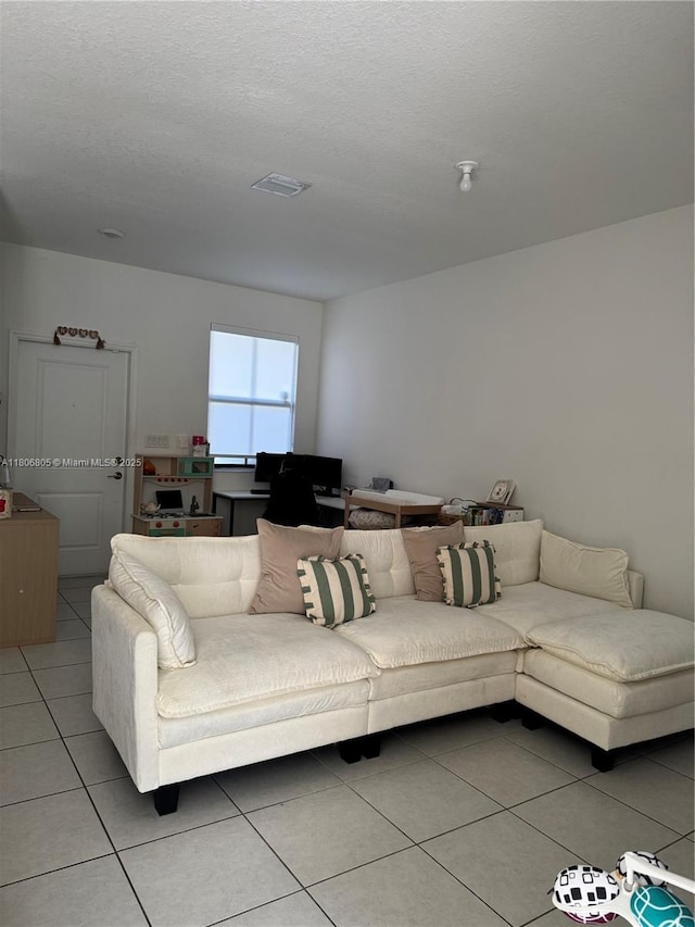 28577 SW 134th Ct, Homestead, FL 33033 - living room featuring light tile patterned floors