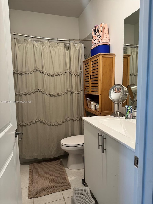28577 SW 134th Ct, Homestead, FL 33033 - bathroom featuring tile patterned flooring, toilet, vanity, and a shower with shower curtain