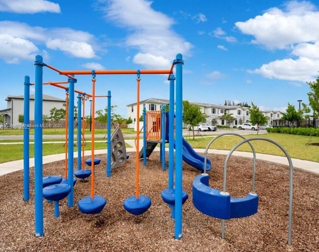 28577 SW 134th Ct, Homestead, FL 33033 - community playground featuring a lawn and a residential view