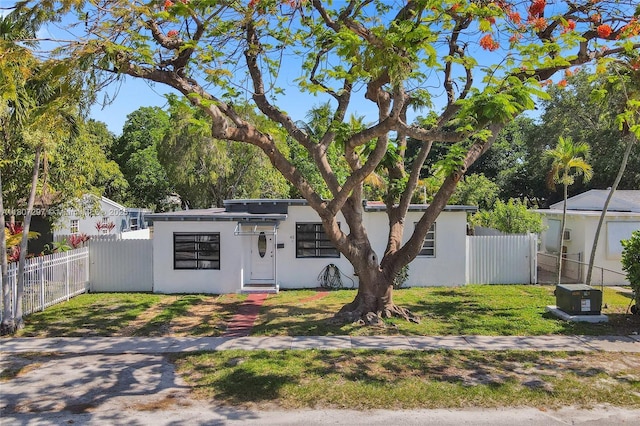 45 NW 127th St, North Miami, FL 33168 - view of front of home featuring stucco siding