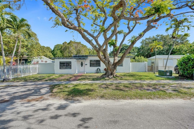 45 NW 127th St, North Miami, FL 33168 - mid-century modern home featuring stucco siding