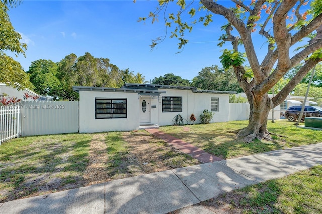 45 NW 127th St, North Miami, FL 33168 - view of front of home with stucco siding