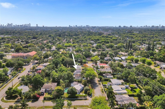 45 NW 127th St, North Miami, FL 33168 - aerial perspective of suburban area featuring skyline