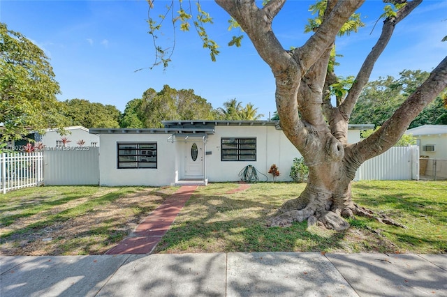 45 NW 127th St, North Miami, FL 33168 - mid-century inspired home featuring stucco siding