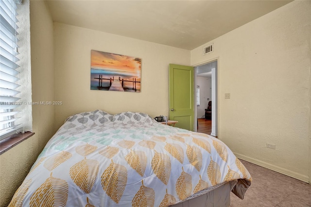 45 NW 127th St, North Miami, FL 33168 - bedroom featuring baseboards
