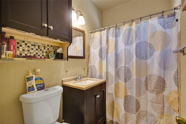 45 NW 127th St, North Miami, FL 33168 - bathroom featuring a textured wall, vanity, toilet, and a shower with curtain