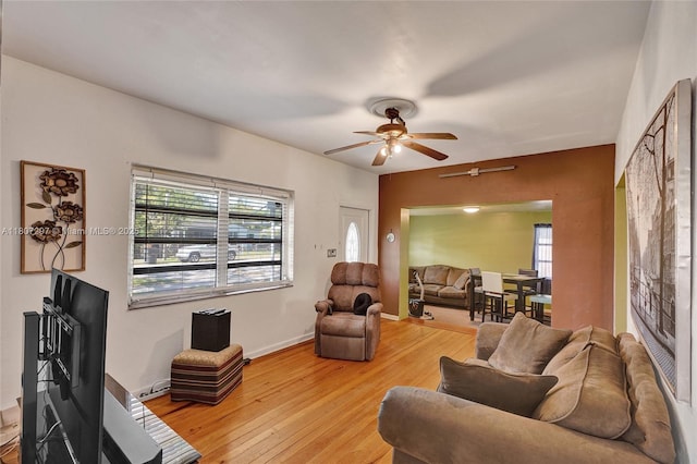 45 NW 127th St, North Miami, FL 33168 - living area featuring a ceiling fan, plenty of natural light, wood finished floors, and baseboards