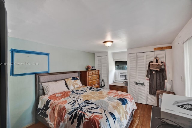 45 NW 127th St, North Miami, FL 33168 - bedroom with two closets and dark wood-style flooring