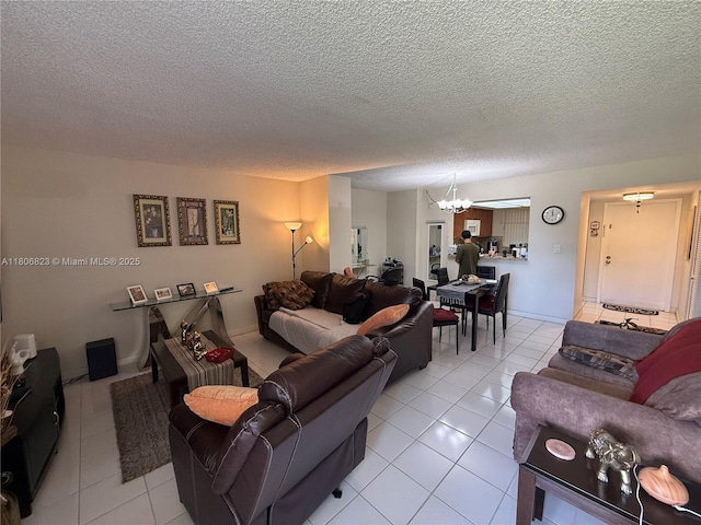 12209 SW 14th Ln Unit 1101, Miami, FL 33184 - living room with a chandelier, light tile patterned floors, and a textured ceiling