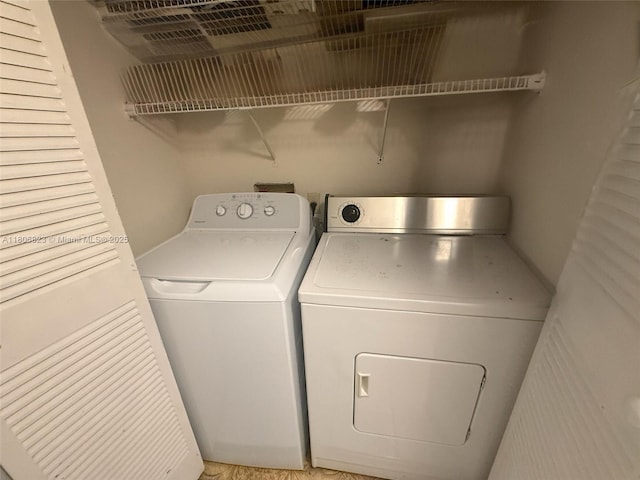 12209 SW 14th Ln Unit 1101, Miami, FL 33184 - laundry area with washer and dryer