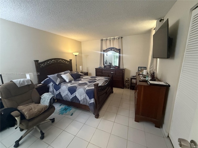 12209 SW 14th Ln Unit 1101, Miami, FL 33184 - bedroom featuring a textured ceiling