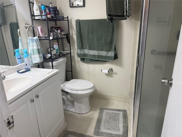 12209 SW 14th Ln Unit 1101, Miami, FL 33184 - bathroom with vanity, a shower stall, tile patterned flooring, and toilet