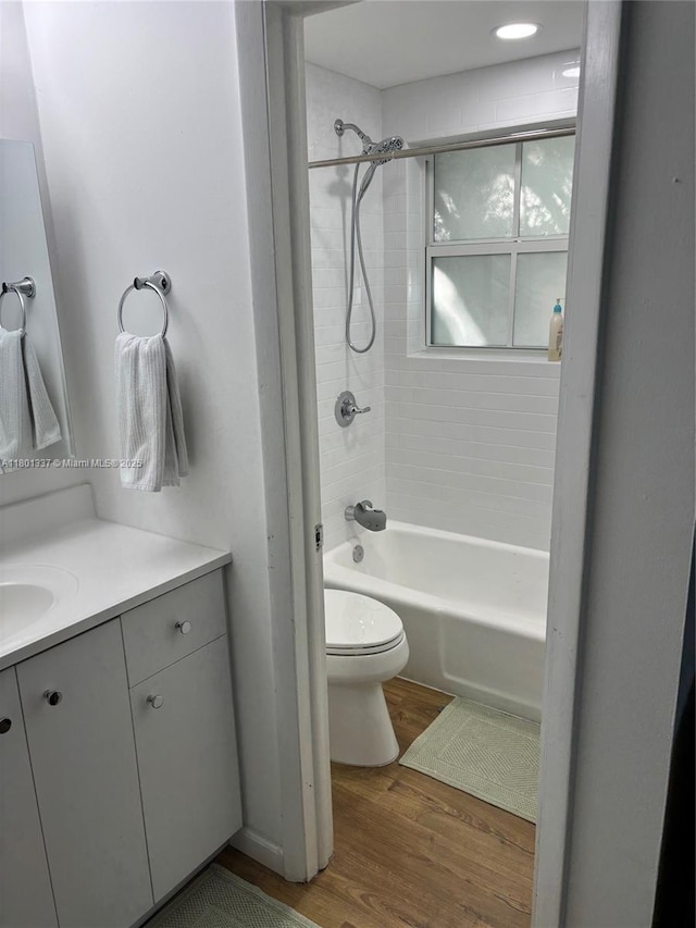 1100 Salzedo St Unit 3A, Coral Gables, FL 33134 - bathroom with wood finished floors, toilet, vanity, and shower / bath combination