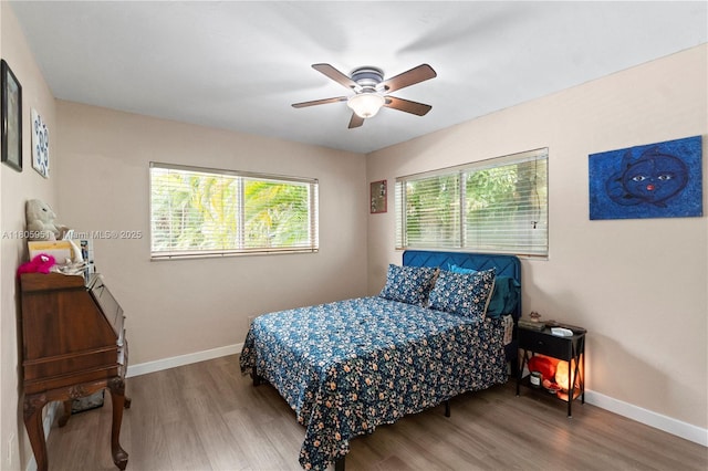 1090 Meadowlark Ave, Miami Springs, FL 33166 - bedroom with wood finished floors and ceiling fan